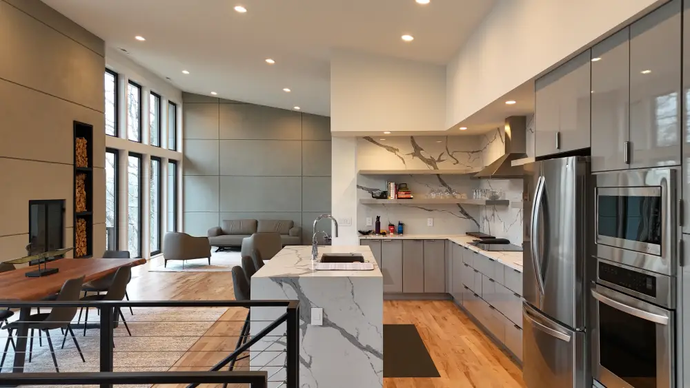 Open interior space with windows and patio doors